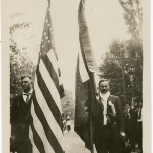 Two Men Holding Flags